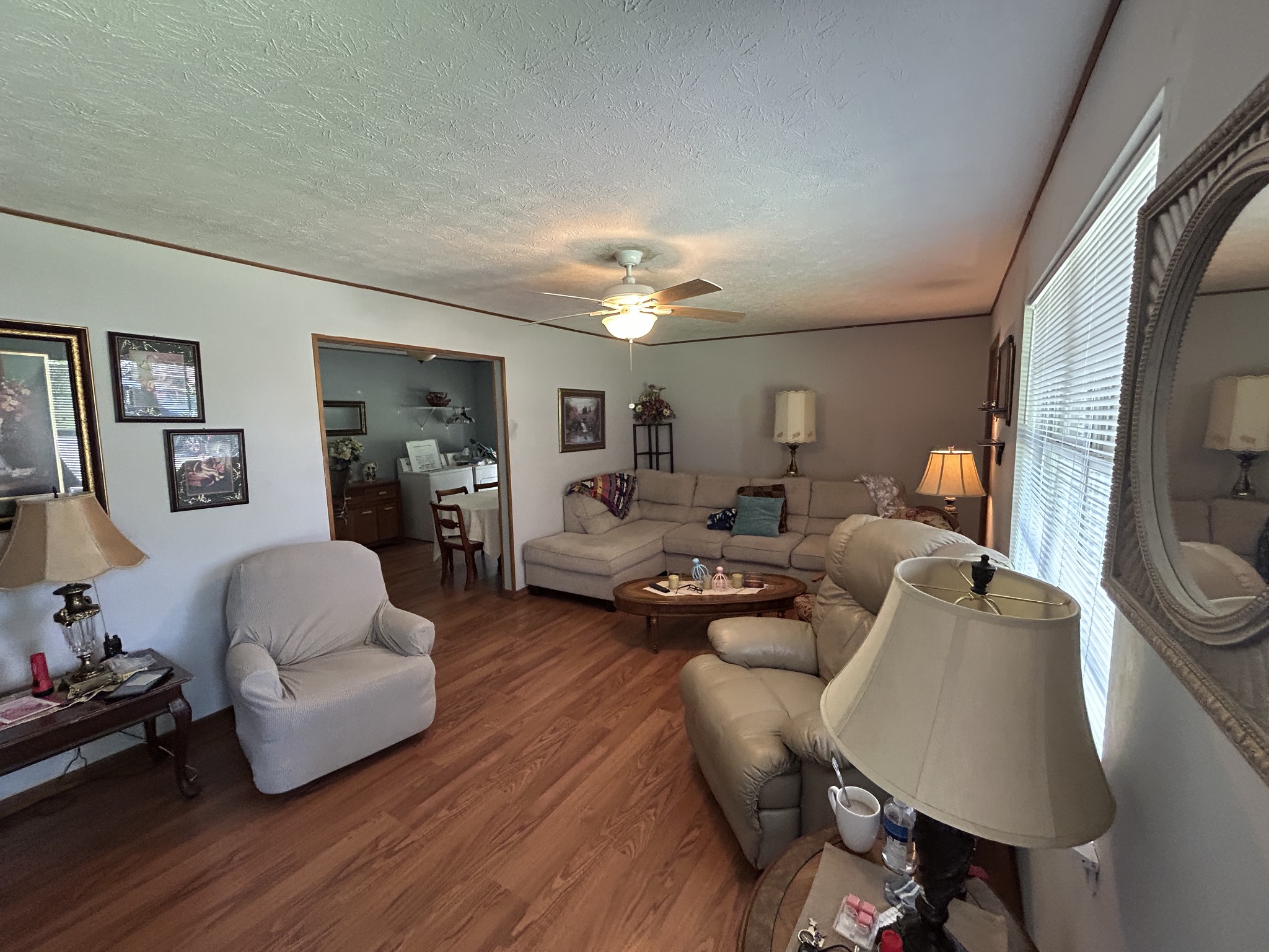 1041 Roysden Road Jamestown, TN 38556 - Photo 9 of 18 a living room with furniture and a lamp