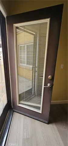 a bathroom with a tub sink toilet and mirror