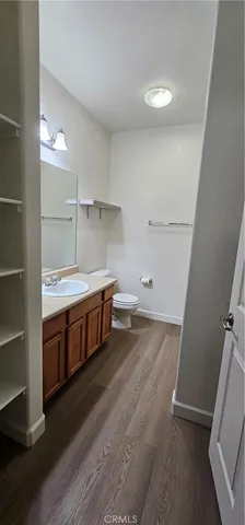 a bathroom with a sink and toilet