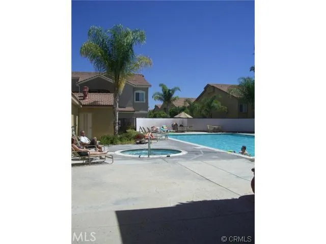 a room with gym equipment and mirror