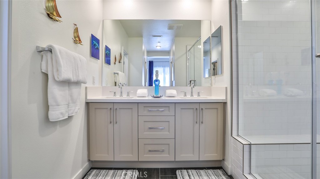 1207 Doheny Way Dana Point, CA 92629 - Photo 22 of 72 Primary en-suite bath and walk-in closet.