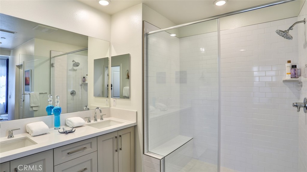 1207 Doheny Way Dana Point, CA 92629 - Photo 23 of 72 Primary en-suite bath and walk-in closet.