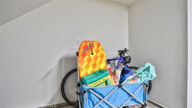 an aerial view of multiple houses with yard