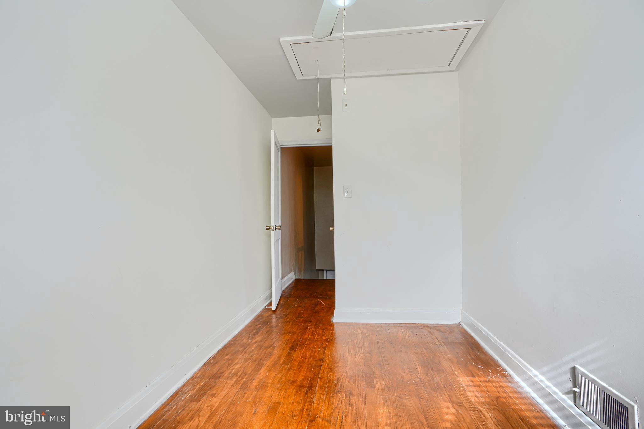 755 South Woodington Road Baltimore, MD 21229 - Photo 18 of 40 a view of a room with wooden floor