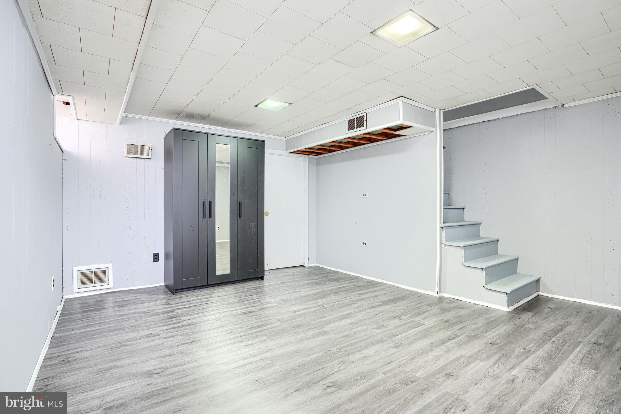 755 South Woodington Road Baltimore, MD 21229 - Photo 27 of 40 a view of empty room with wooden floor