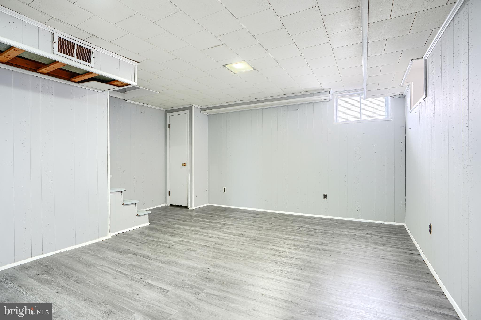 755 South Woodington Road Baltimore, MD 21229 - Photo 28 of 40 a view of a room with wooden floor