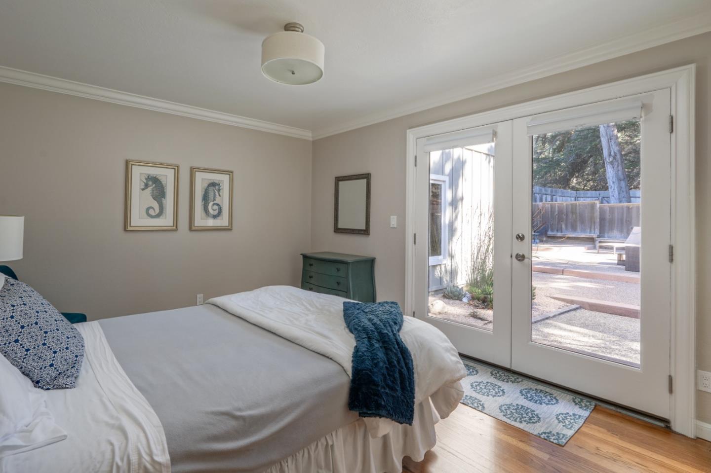 142 Carmel Riviera Drive Carmel, CA 93923 - Photo 16 of 23 a bedroom with a large bed and a window