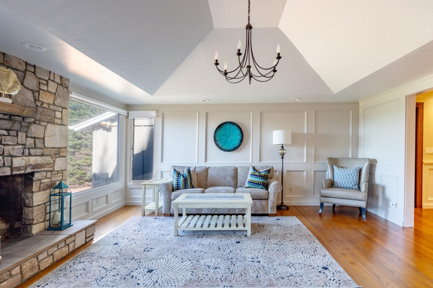 142 Carmel Riviera Drive Carmel, CA 93923 - Photo 4 of 23 a living room with furniture and a wooden floor