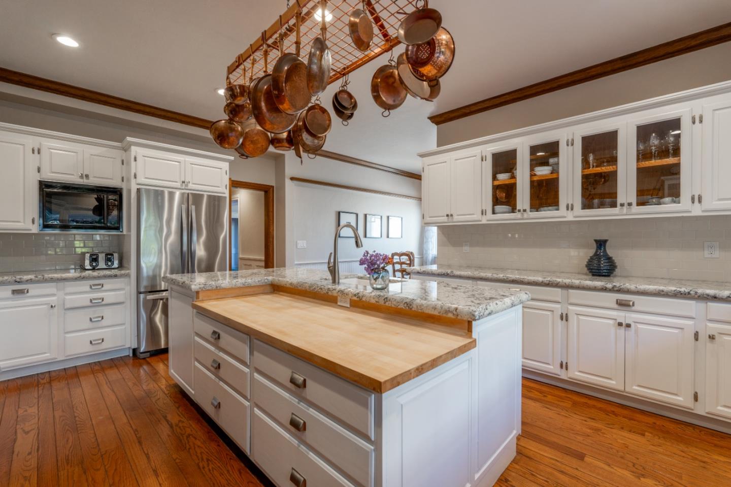 142 Carmel Riviera Drive Carmel, CA 93923 - Photo 7 of 23 a kitchen with a sink appliances and cabinets
