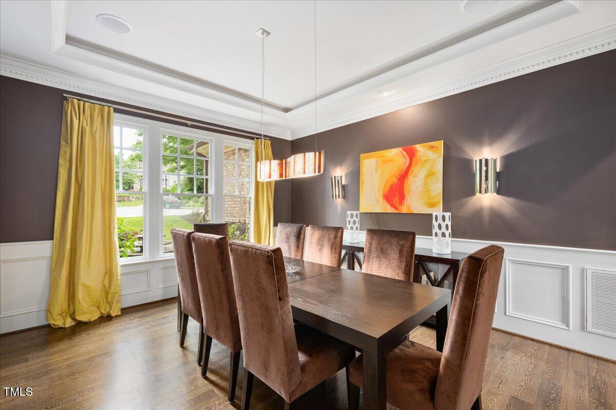 3601 Nightfall Court Raleigh, NC 27607 - Photo 11 of 88 a view of a dining room with furniture window and wooden floor