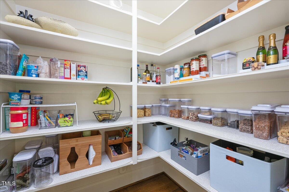 3601 Nightfall Court Raleigh, NC 27607 - Photo 18 of 88 a utility room with stainless steel appliances lots of clutter and cabinets
