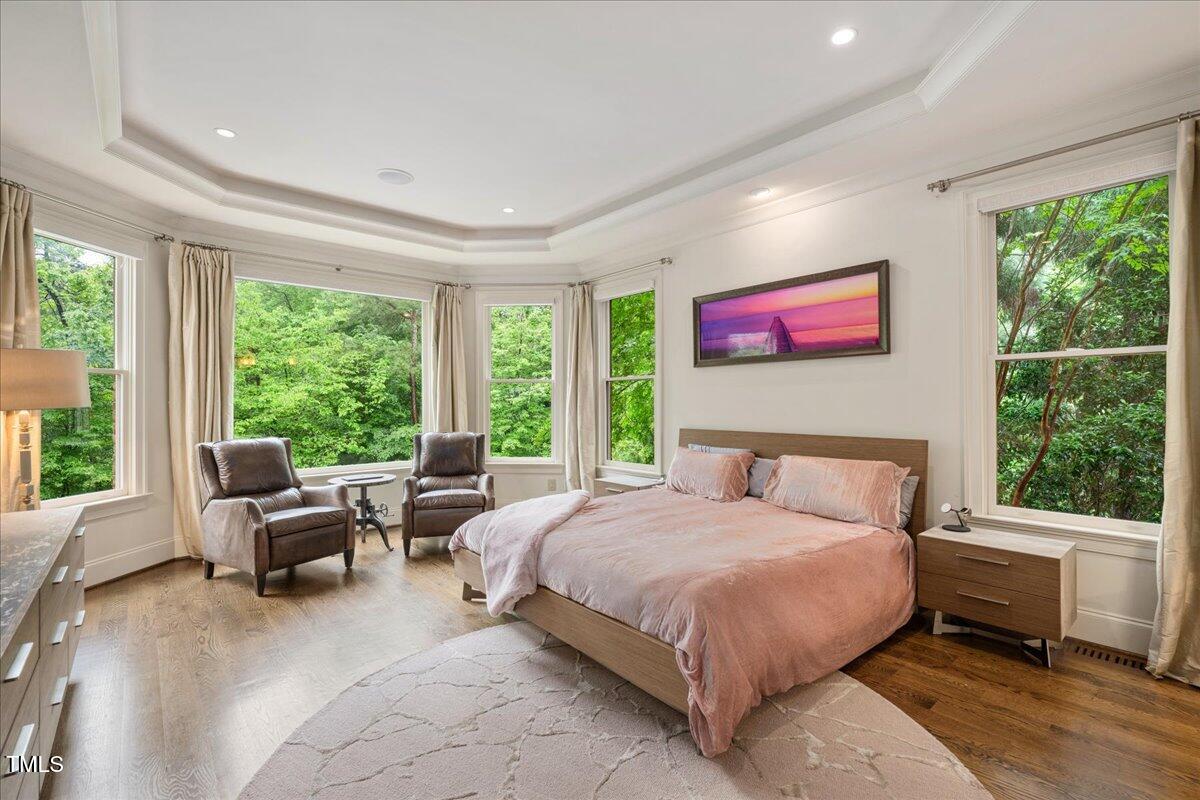 3601 Nightfall Court Raleigh, NC 27607 - Photo 21 of 88 a bedroom with a bed and a large window