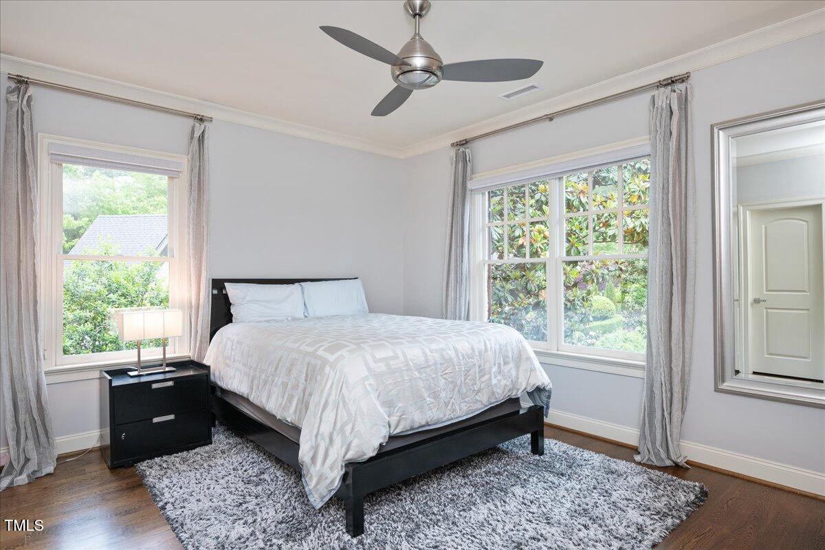 3601 Nightfall Court Raleigh, NC 27607 - Photo 30 of 88 a bedroom with a bed and a window