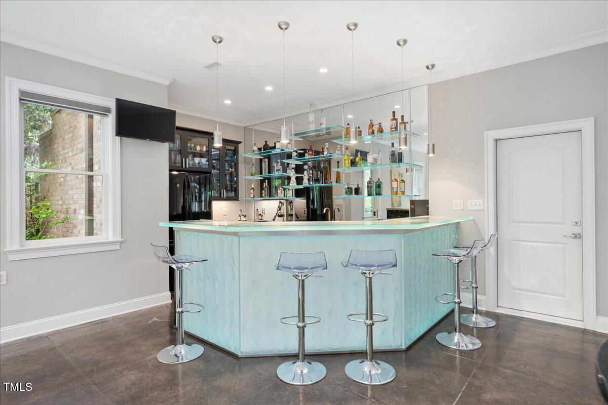 3601 Nightfall Court Raleigh, NC 27607 - Photo 38 of 88 a kitchen with stainless steel appliances granite countertop a sink and cabinets