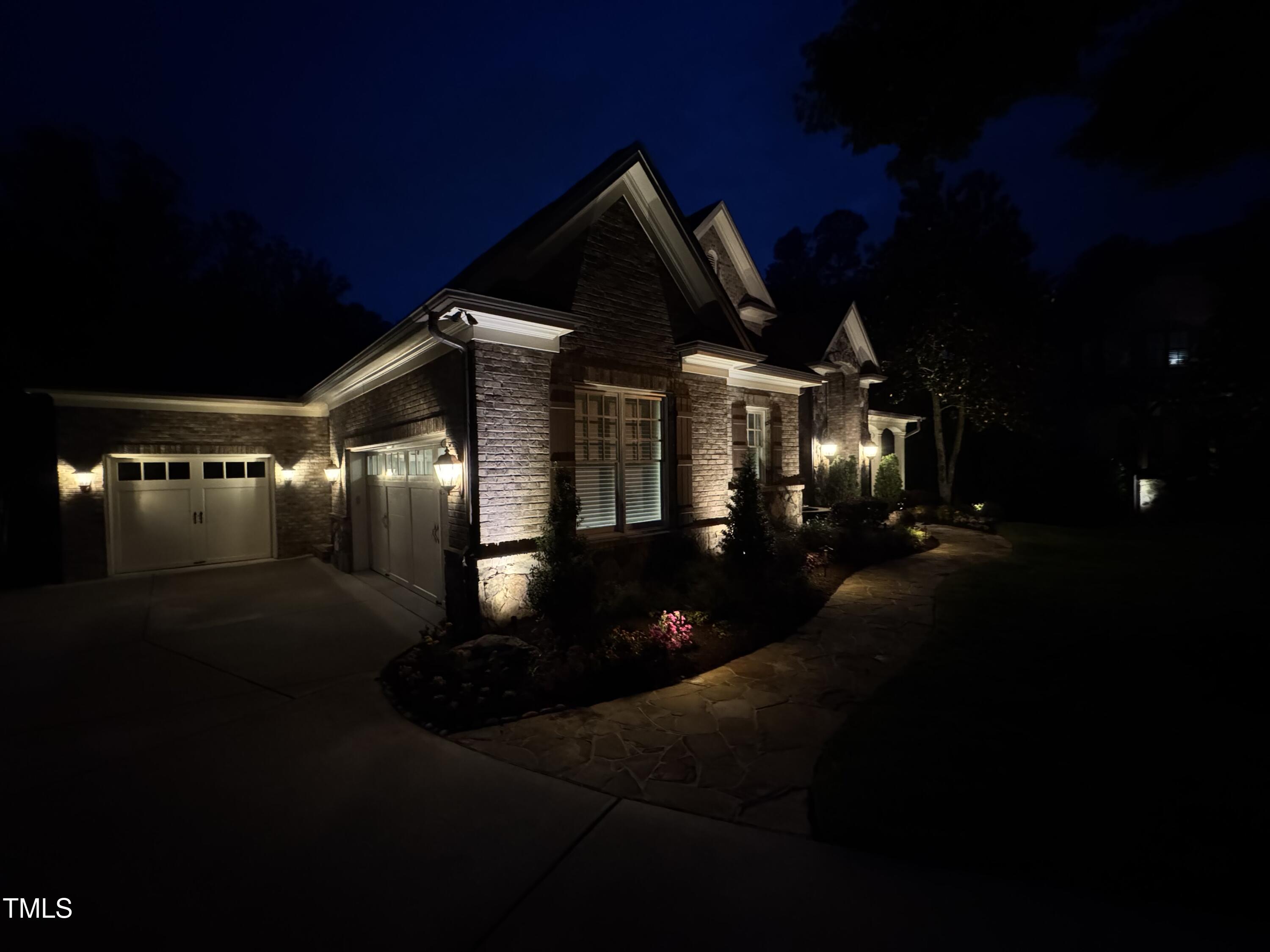 3601 Nightfall Court Raleigh, NC 27607 - Photo 52 of 88 a front view of a house with lots of green space and yard