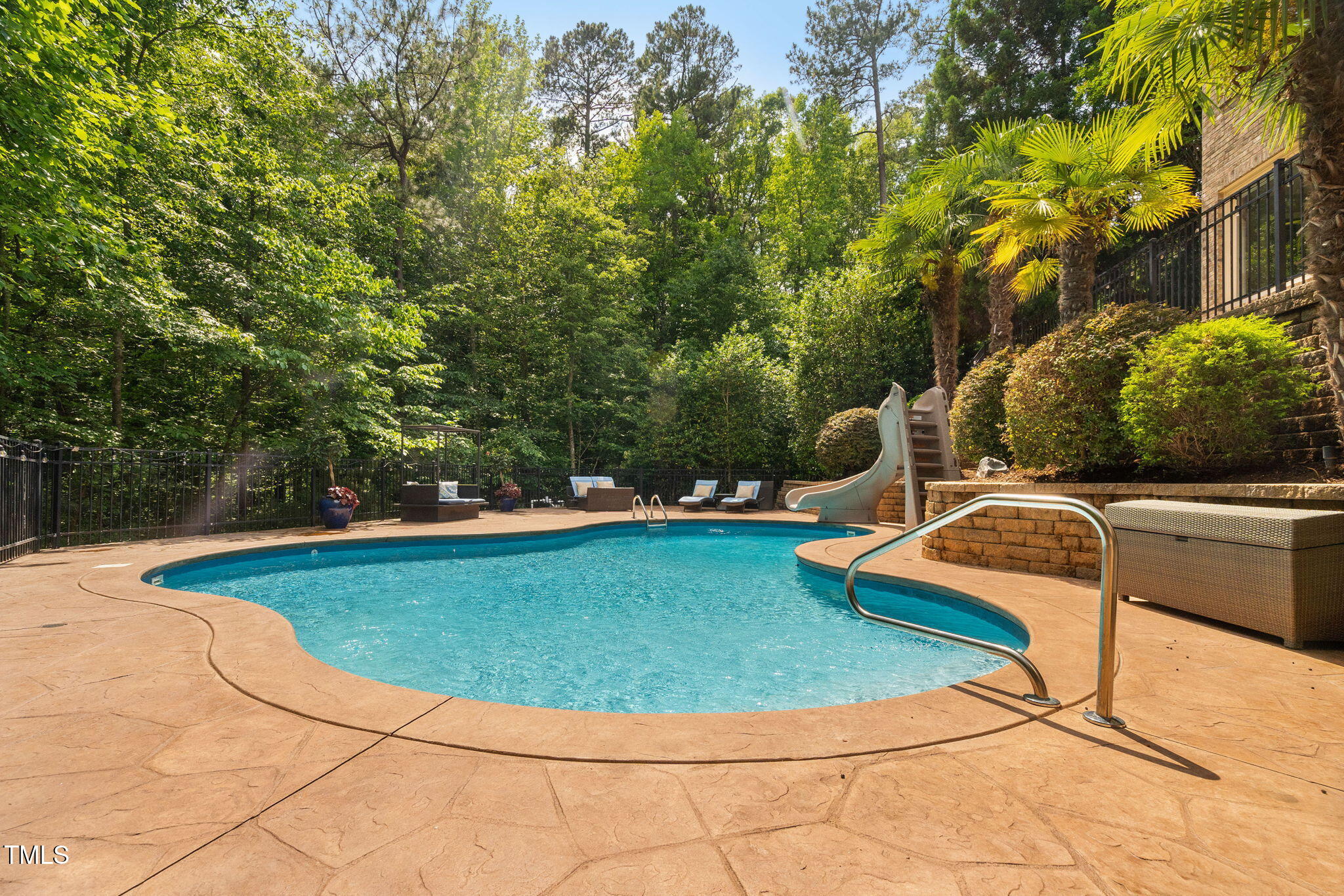 3601 Nightfall Court Raleigh, NC 27607 - Photo 70 of 88 a view of a swimming pool with seating