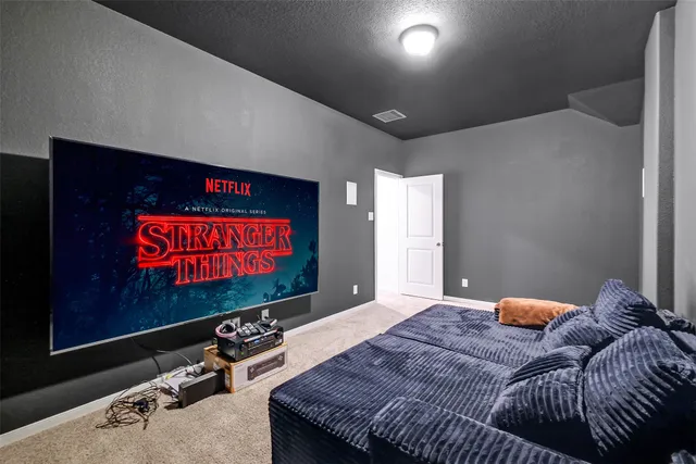 a view of balcony with furniture