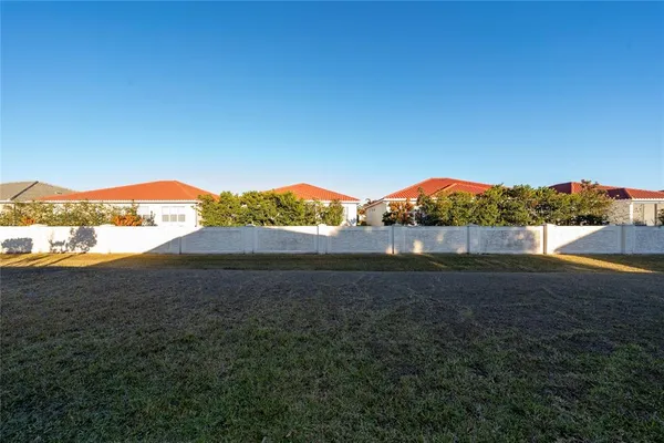 a house with trees in the background