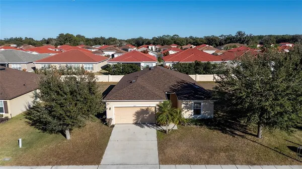 a view of a hallway with wooden shelves