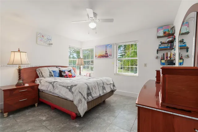 a bed room with a bed and a table