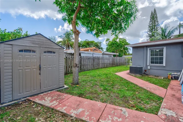 a view of a backyard with a garden