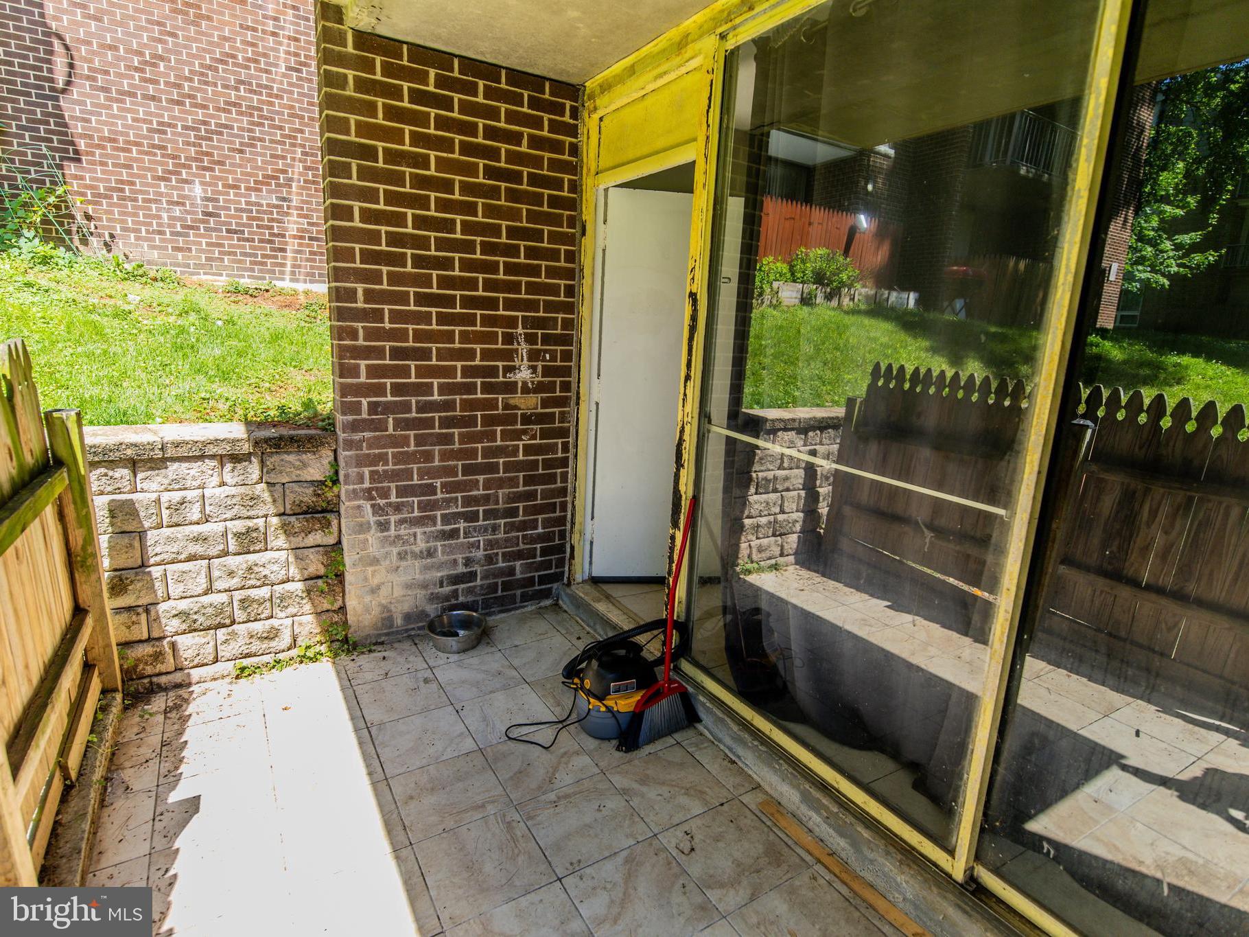 3934 Bel Pre Road, Unit 39342 Silver Spring, MD 20906 - Photo 25 of 30 a view of balcony with a floor to ceiling window