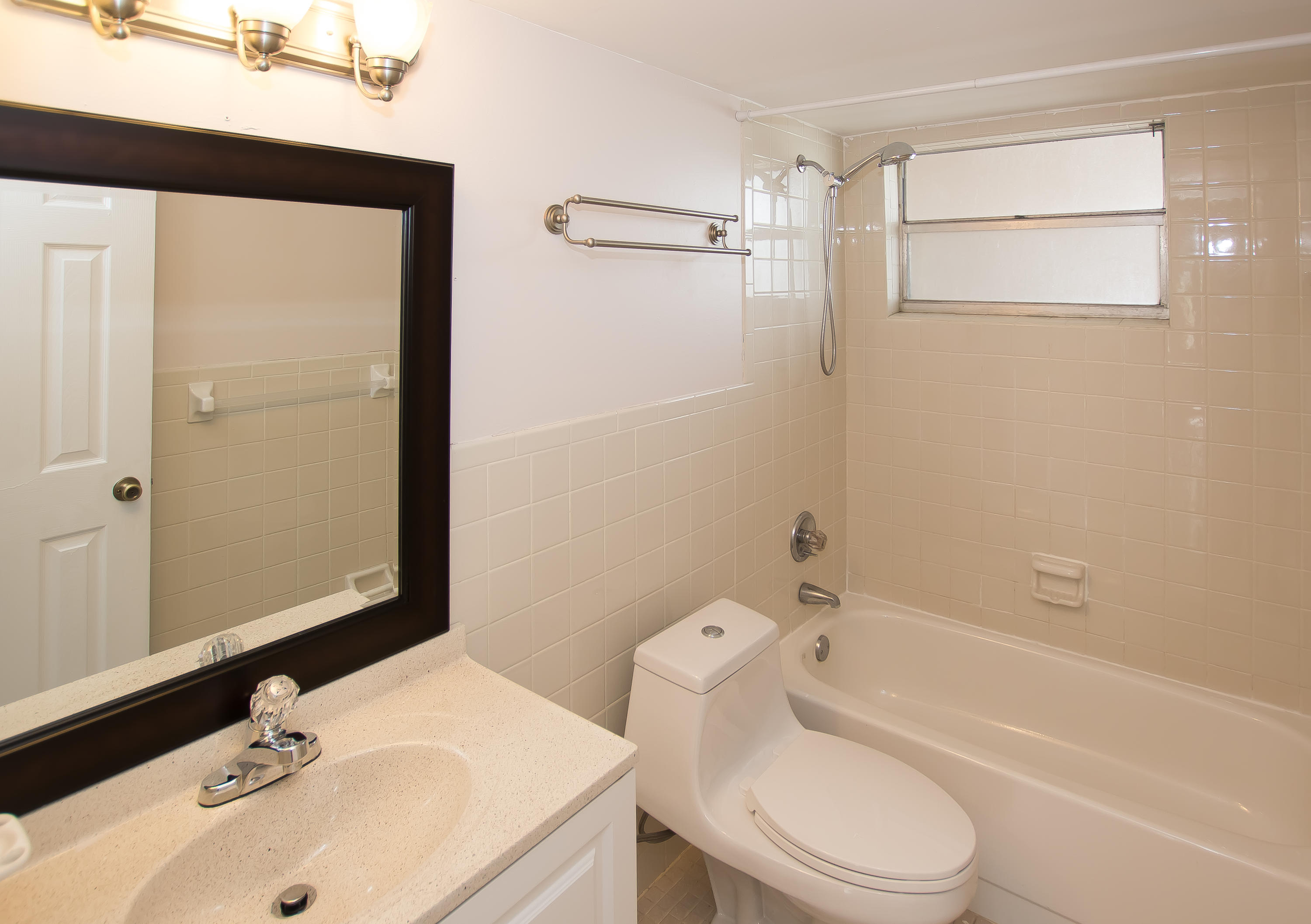 7080 Nova Drive, Unit 306B Davie, FL 33317 - Photo 24 of 25 a bathroom with a sink toilet and shower