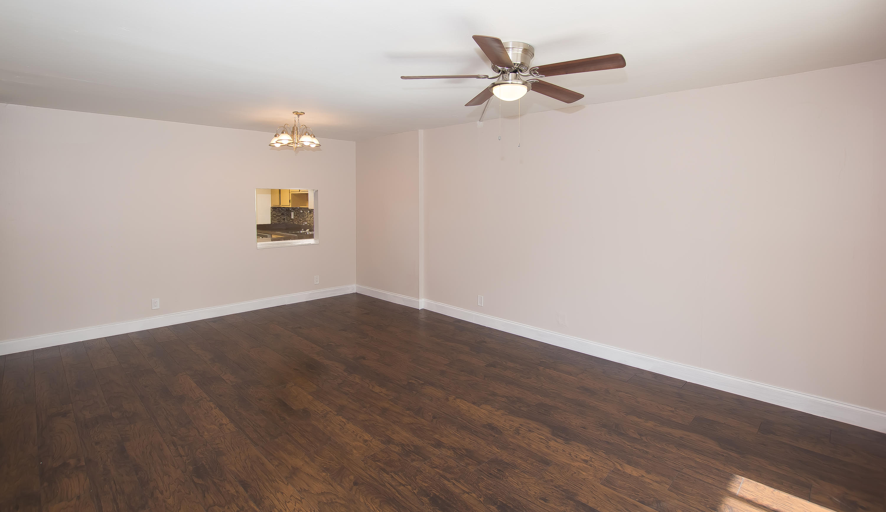 7080 Nova Drive, Unit 306B Davie, FL 33317 - Photo 5 of 25 wooden floor in an empty room