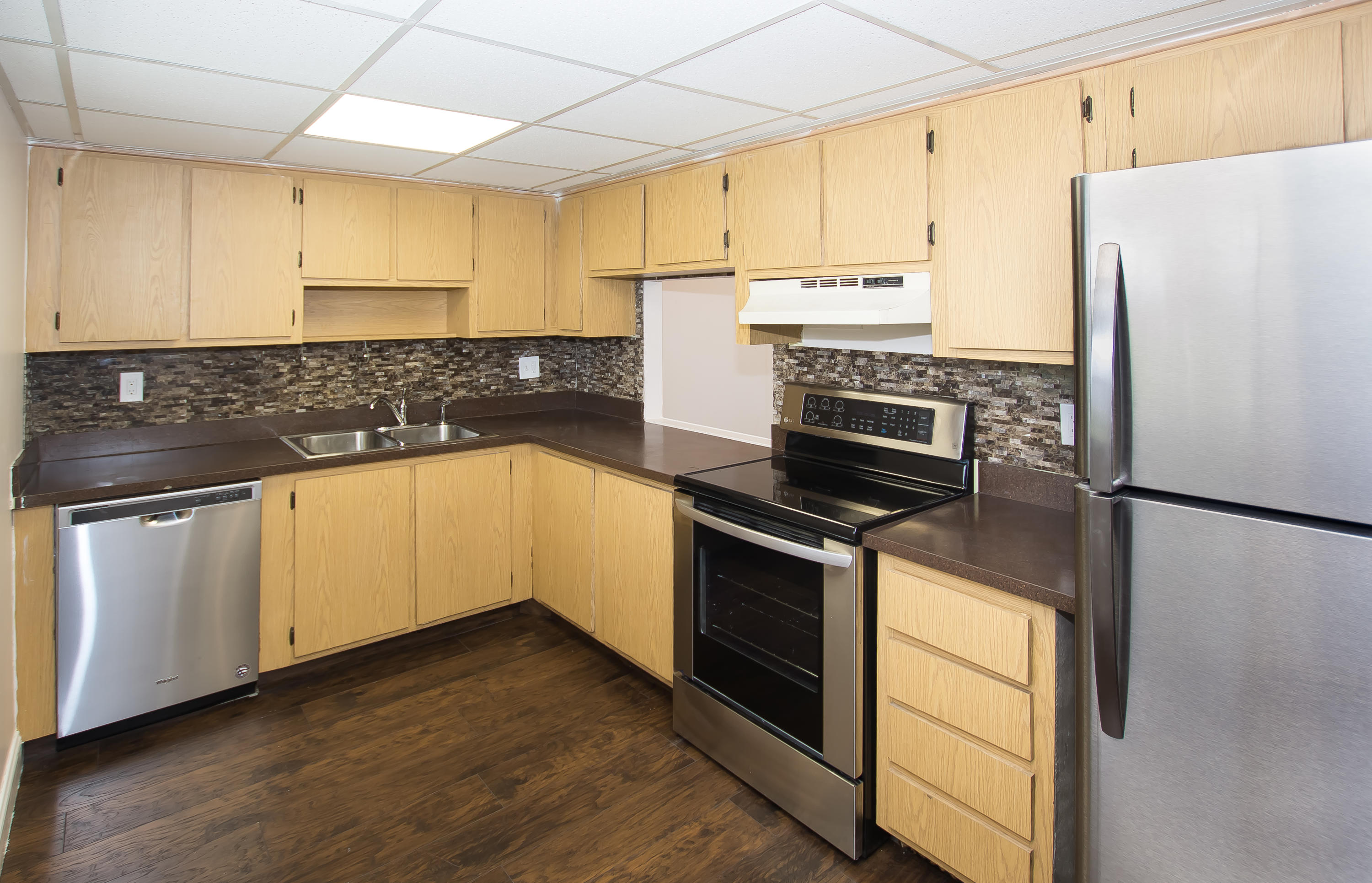 7080 Nova Drive, Unit 306B Davie, FL 33317 - Photo 7 of 25 a kitchen with a refrigerator sink and stove