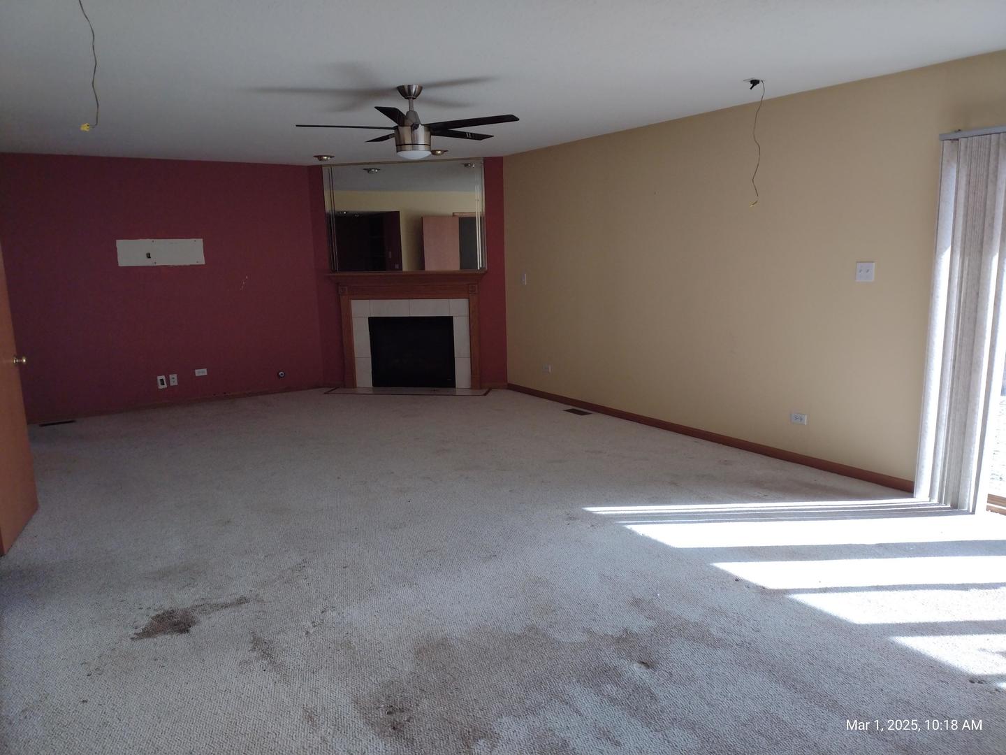 41 Manor Drive Matteson, IL 60443 - Photo 14 of 45 a view of a livingroom with a fireplace and a ceiling fan