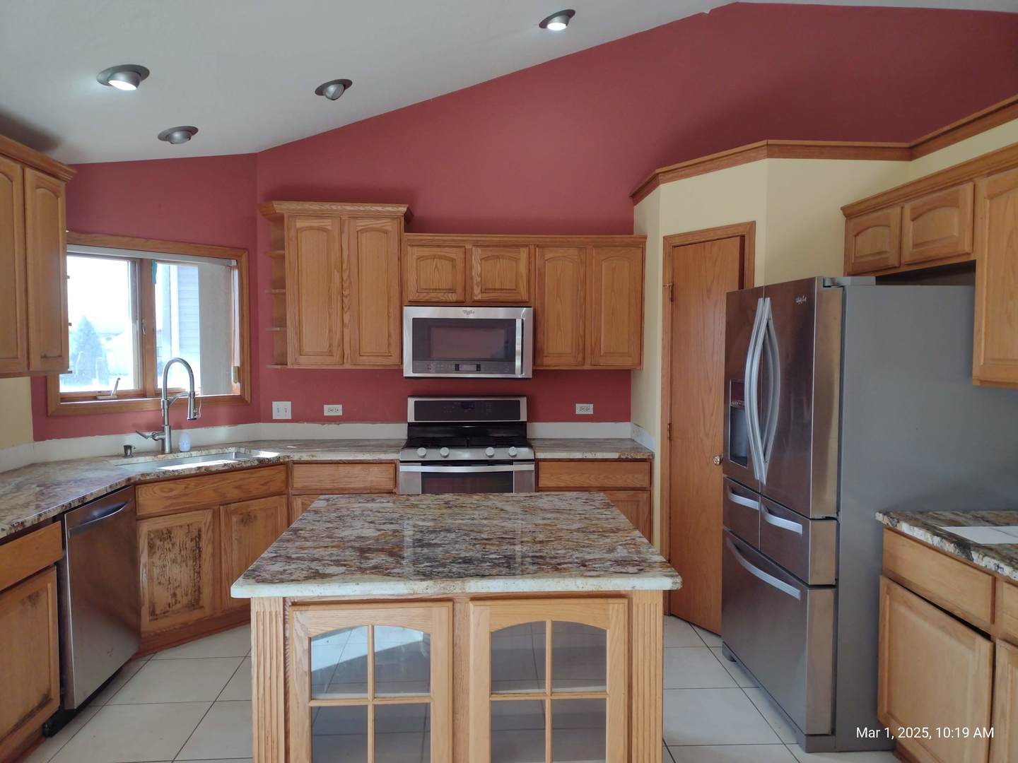 41 Manor Drive Matteson, IL 60443 - Photo 18 of 45 a kitchen with stainless steel appliances granite countertop a sink stove and refrigerator