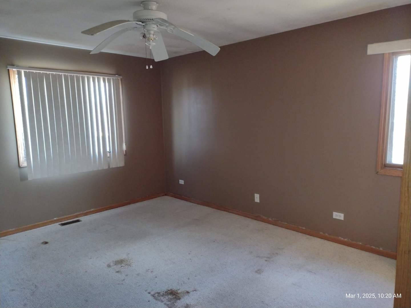 41 Manor Drive Matteson, IL 60443 - Photo 25 of 45 an empty room with a window and a ceiling fan
