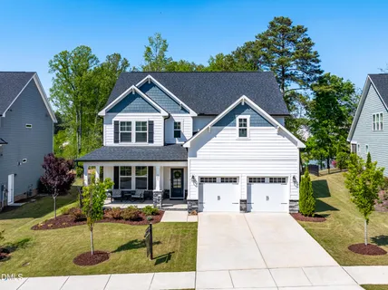 a view of swimming pool with outdoor seating