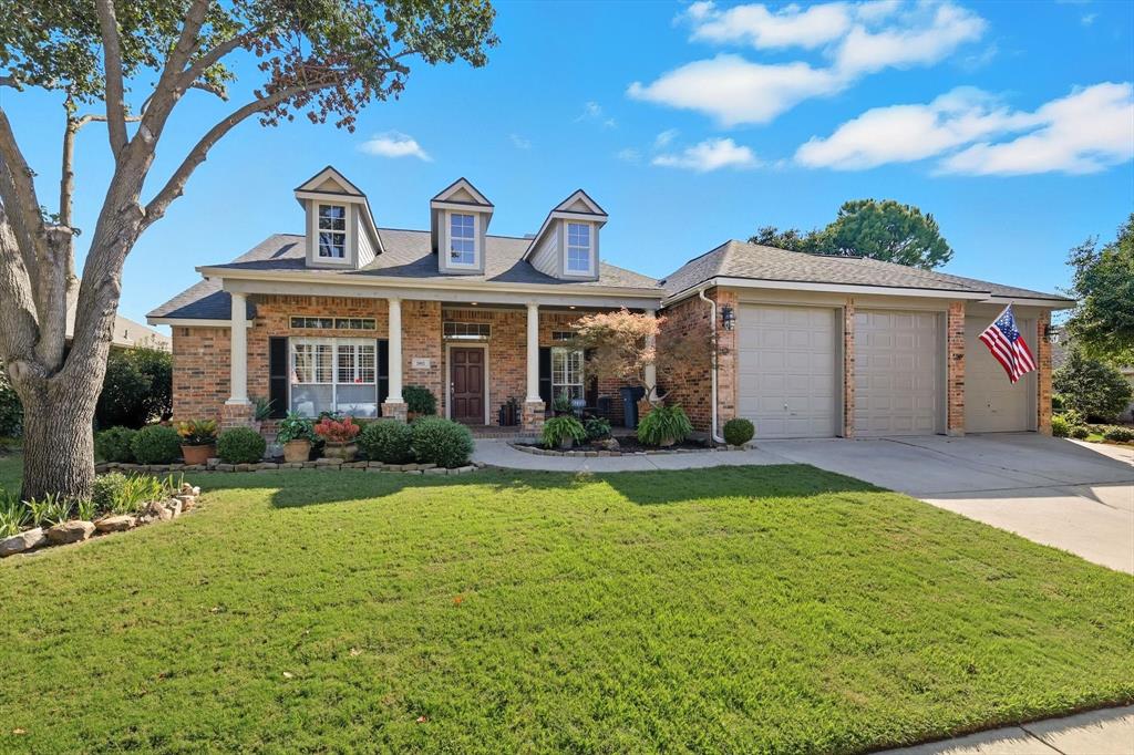 2012 Hayden Lane Corinth, TX 76210 - Photo 2 of 40 a front view of a house with garden