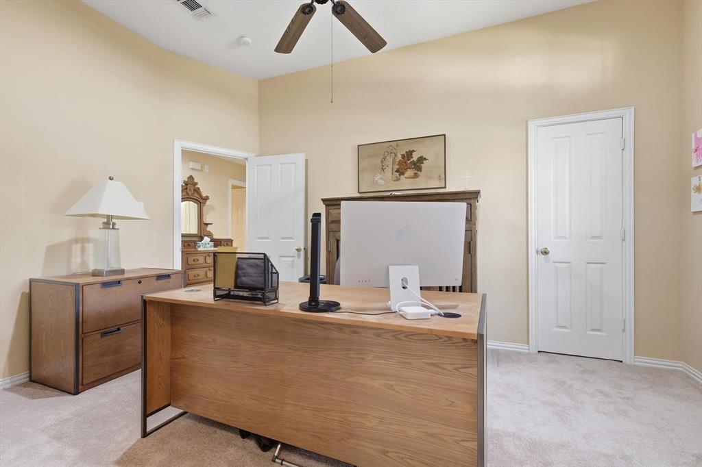 2012 Hayden Lane Corinth, TX 76210 - Photo 33 of 40 a room with a couch and a view of kitchen