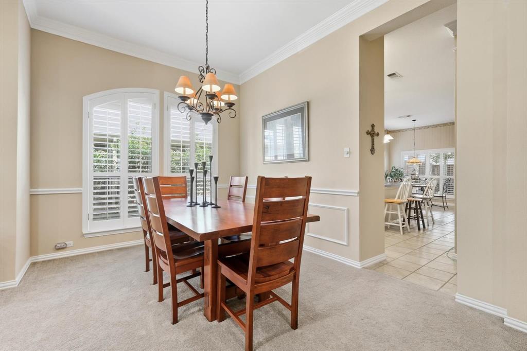 2012 Hayden Lane Corinth, TX 76210 - Photo 9 of 40 a view of a dining room with furniture window and outside view