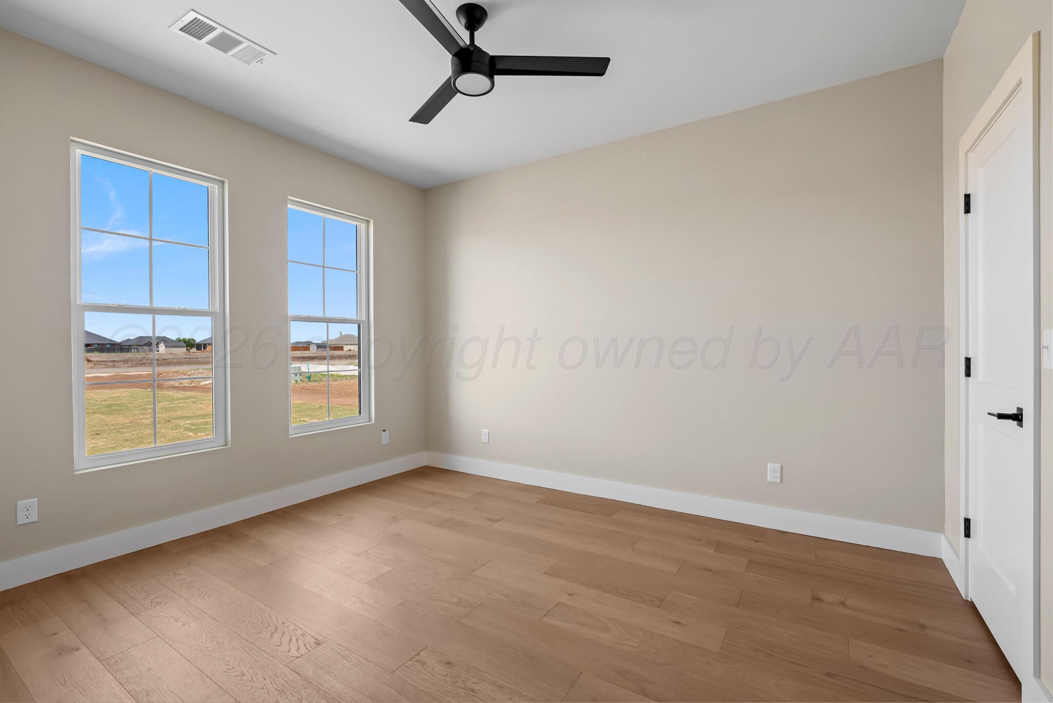 4201 Juniper Springs Road Amarillo, TX 79119 - Photo 15 of 27 a view of an empty room with a window