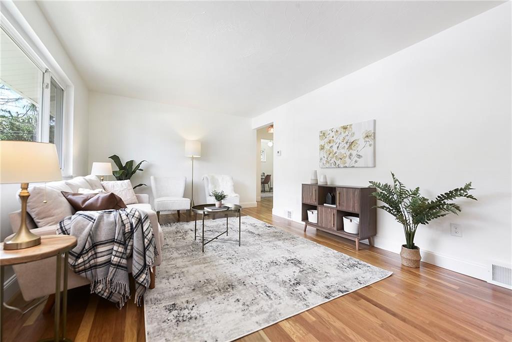 3486 Evergreen Road Pittsburgh, PA 15237 - Photo 3 of 25 a living room with furniture rug and wooden floor