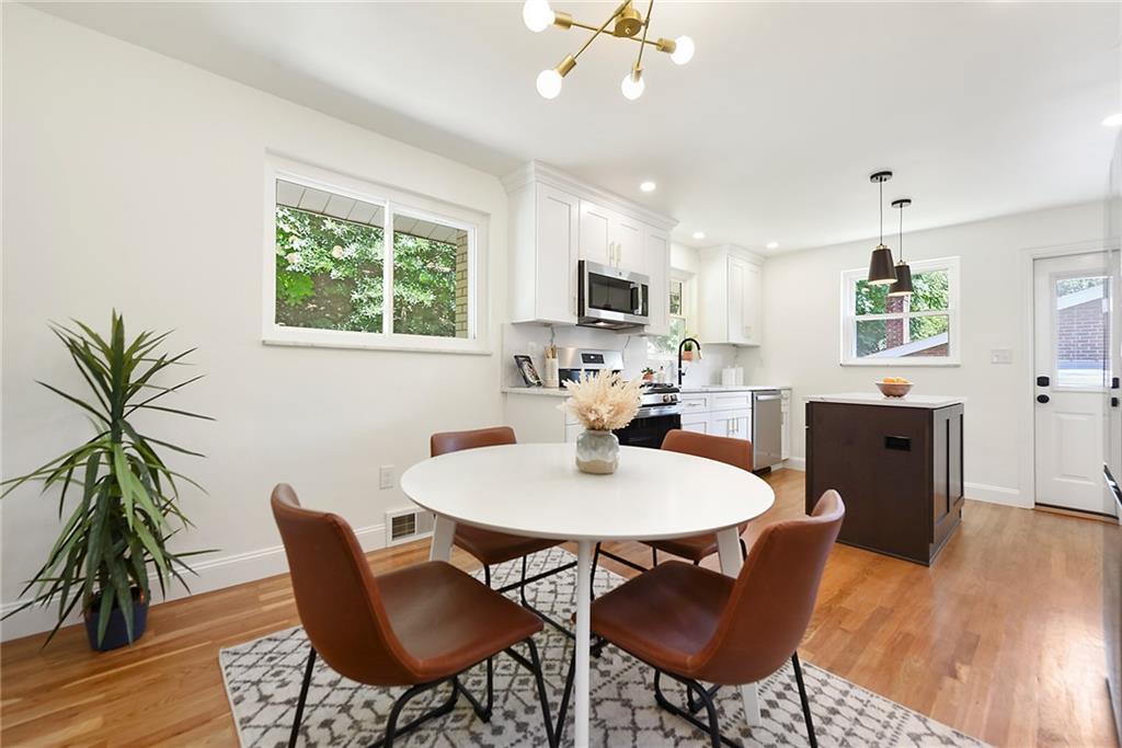 3486 Evergreen Road Pittsburgh, PA 15237 - Photo 9 of 25 a view of a dining room with furniture window and wooden floor