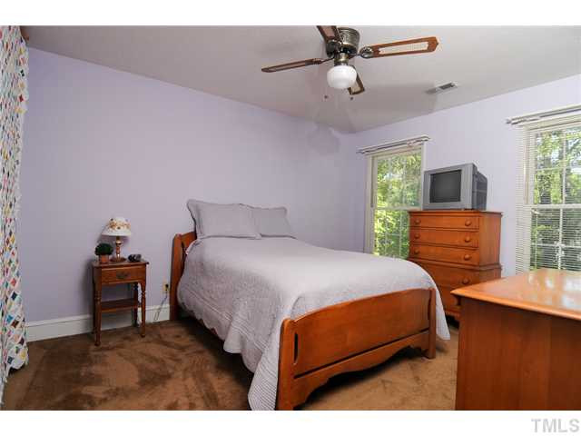 4018 Swarthmore Road Durham, NC 27707 - Photo 12 of 21 The bedrooms have good closet space and ceiling fans. Bedroom