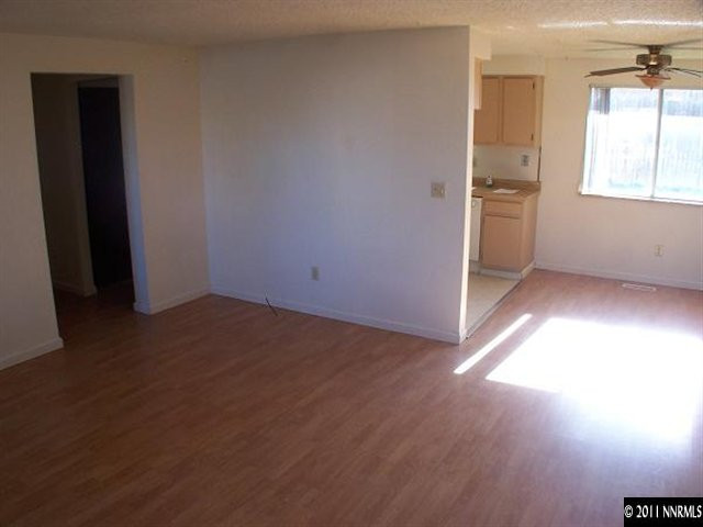 14045 Feldspar Court Reno, NV 89521 - Photo 5 of 13 an empty room with windows and closet