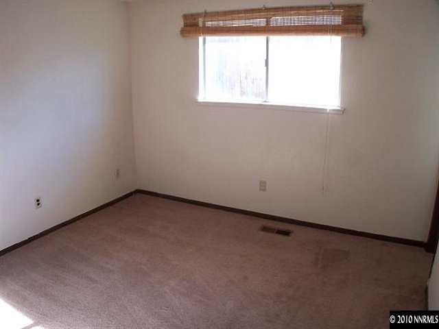 14045 Feldspar Court Reno, NV 89521 - Photo 8 of 13 an empty room with a window
