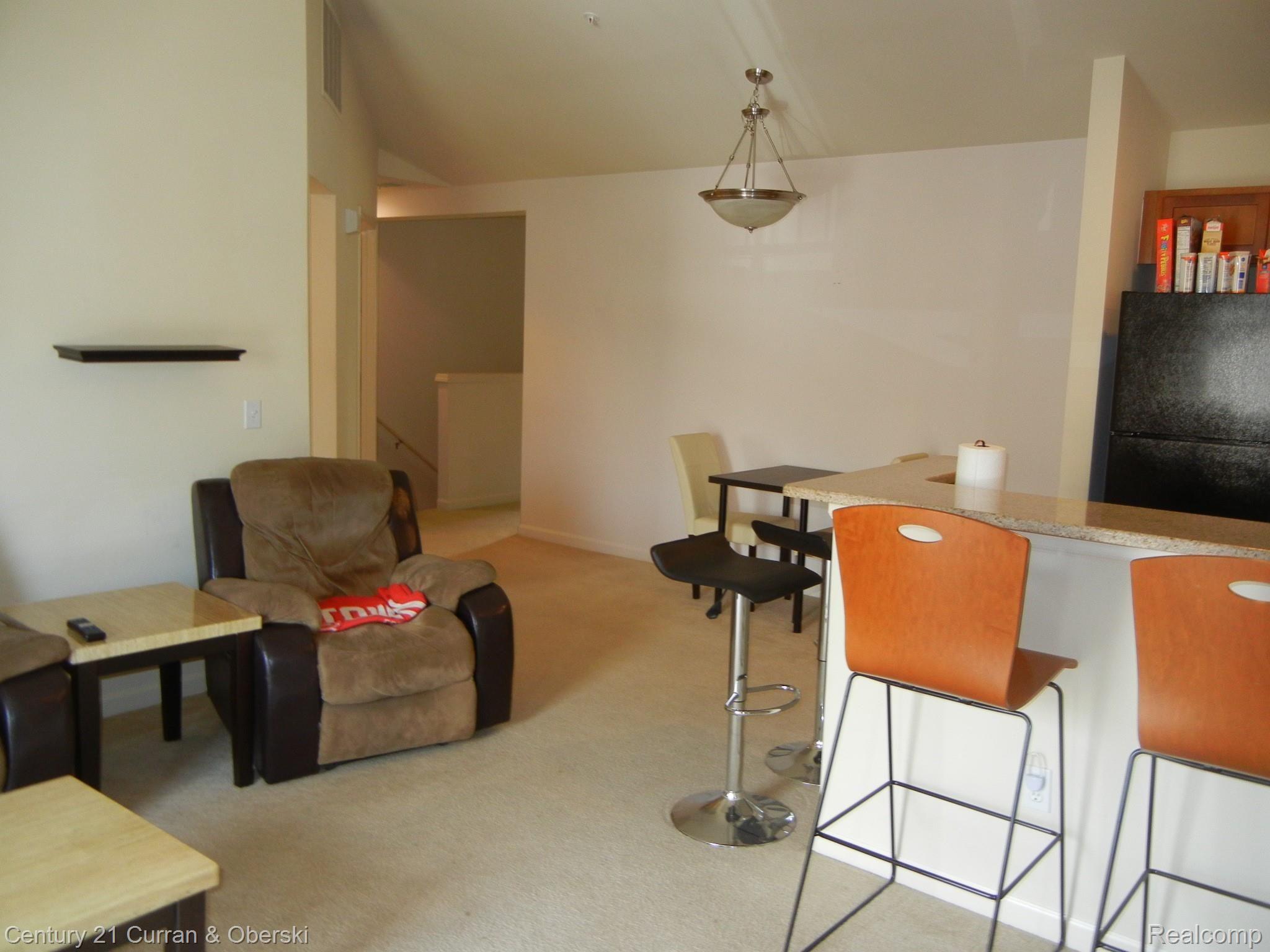 270 North Wixom Road, Unit 60 Wixom, MI 48393 - Photo 13 of 26 Looking towards entrance, Laundry and extra storage area
