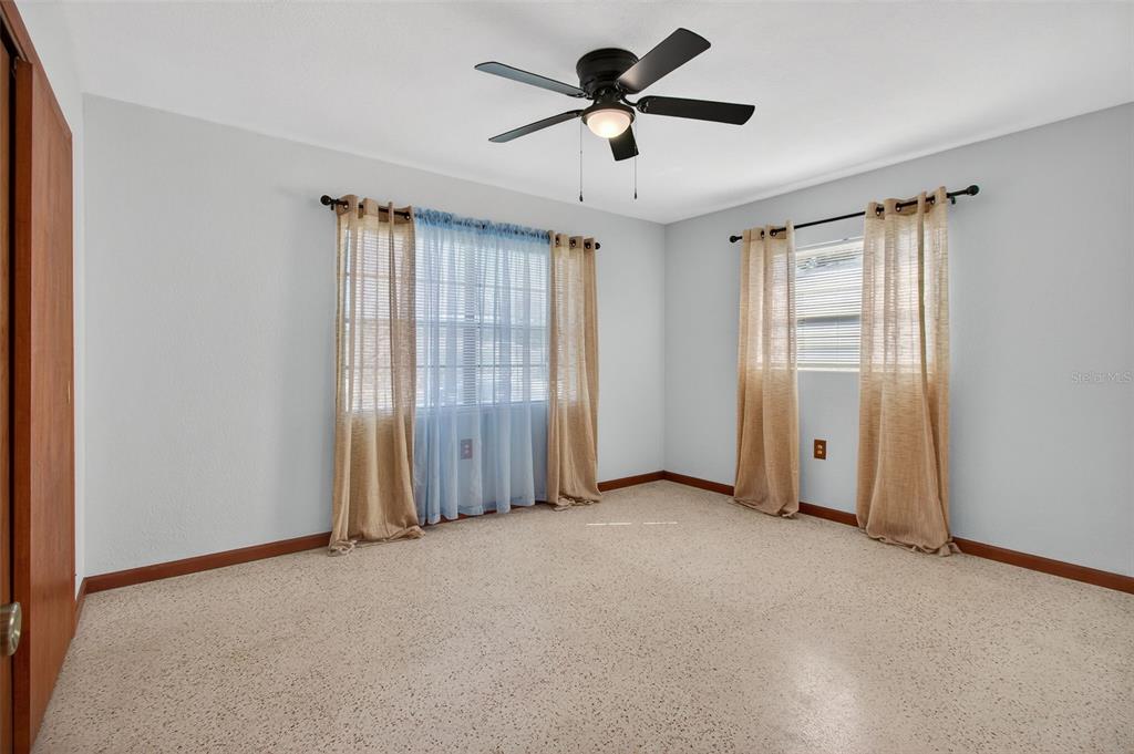 1541 Illinois Road Clearwater, FL 33756 - Photo 26 of 44 a view of an empty room with a window