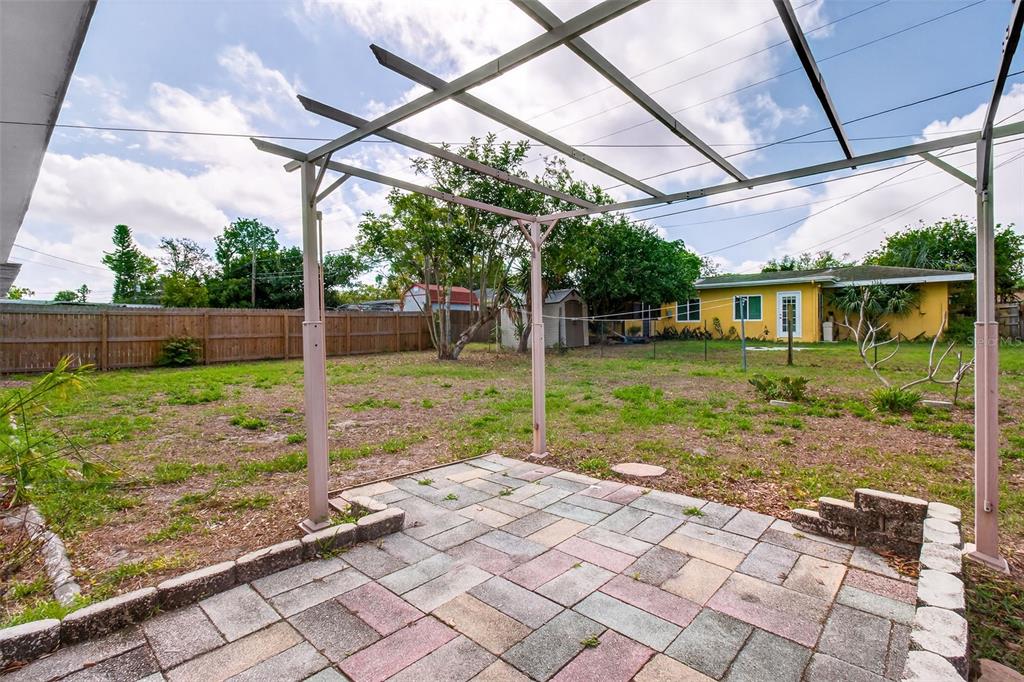 1541 Illinois Road Clearwater, FL 33756 - Photo 31 of 44 a view of a porch with a backyard