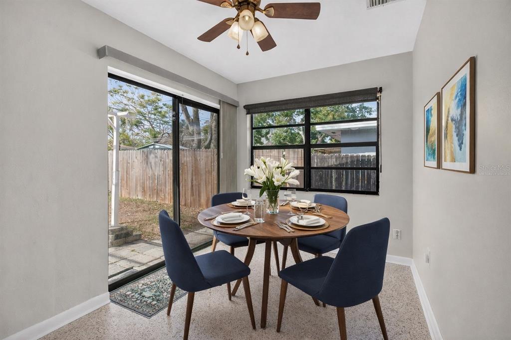 1541 Illinois Road Clearwater, FL 33756 - Photo 8 of 44 a view of a dining room with furniture window and outside view