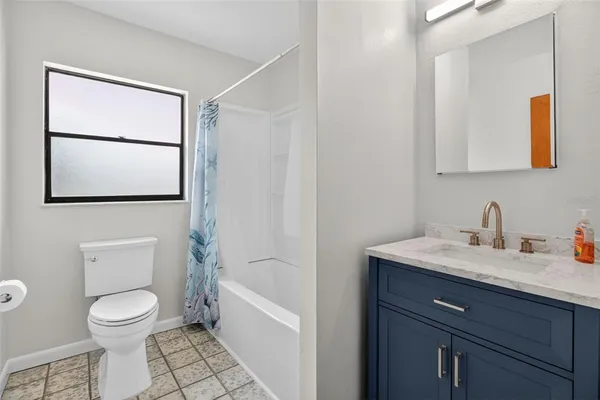 a view of an empty room with storage