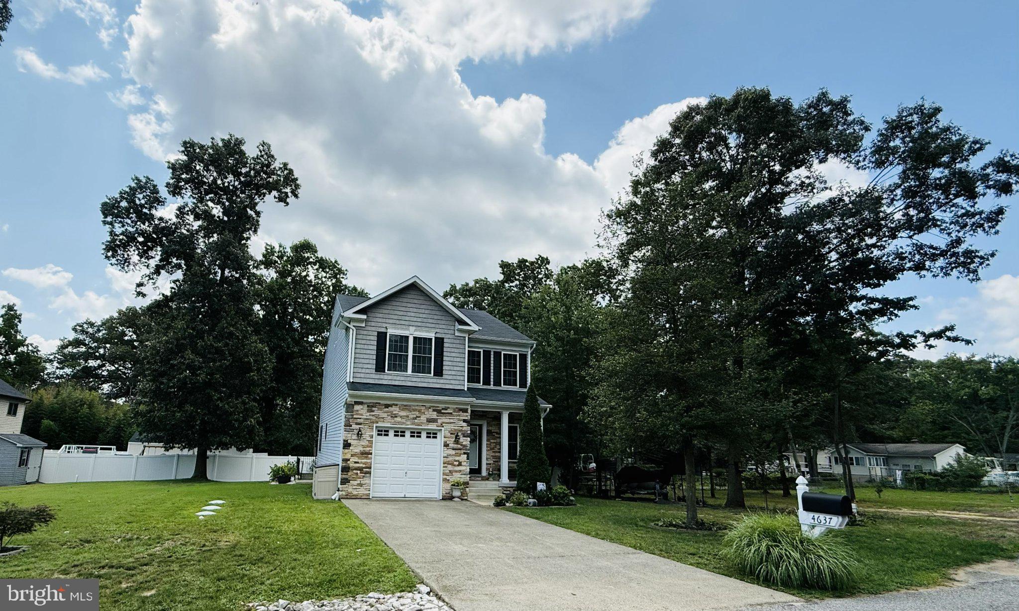 4637 Potomac Road Pasadena, MD 21122 - Photo 1 of 1 Charming home with lush greenery.