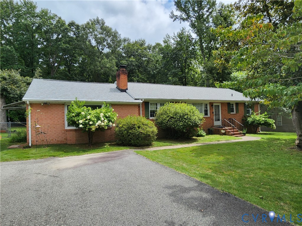 5325 Meadoway Road Richmond, VA 23234 - Photo 1 of 15 Ranch-style home featuring brick siding, a chimney