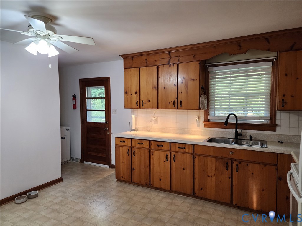 5325 Meadoway Road Richmond, VA 23234 - Photo 13 of 15 Kitchen with light floors, light countertops, tast